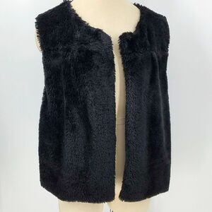 Black faux fur vest,‎ by Cejon. Large and super soft and cozy. Great condition.